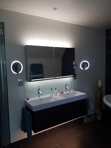 Bathroom mirror lighting installed by Reed Electrical